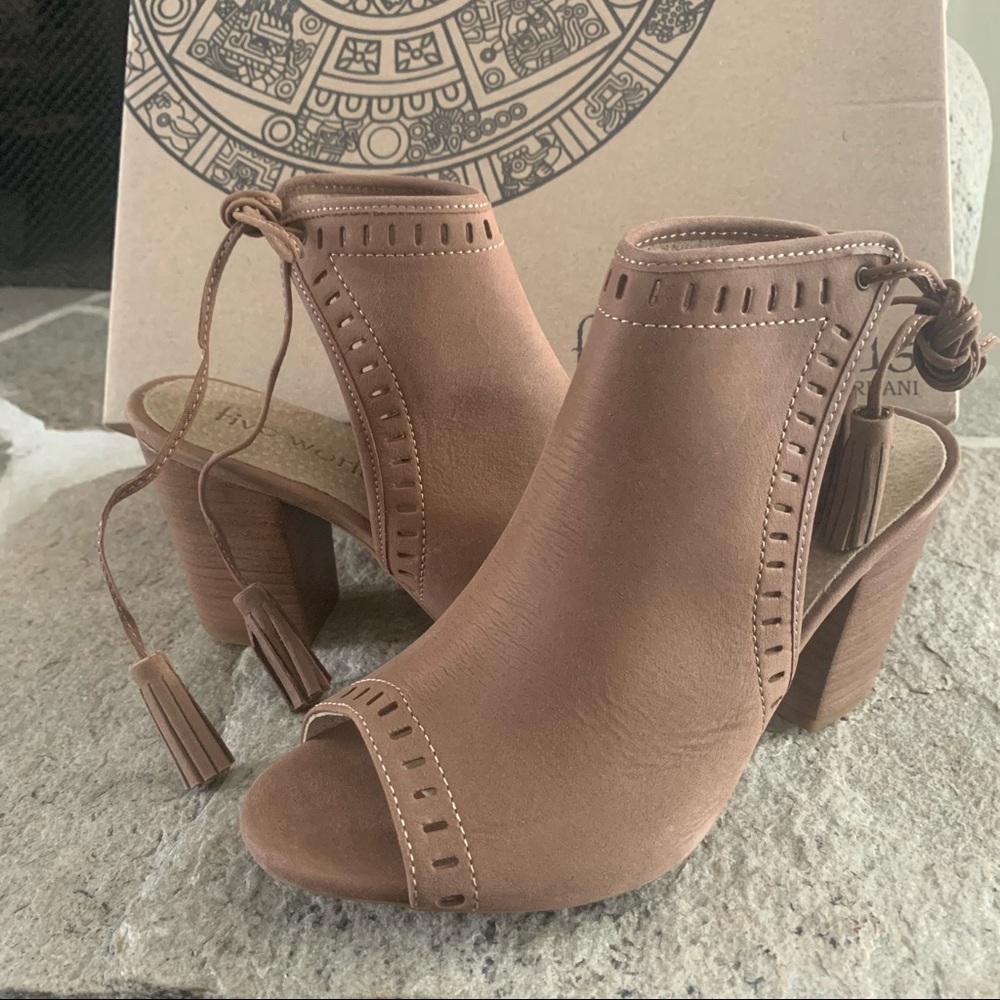 Heeled leather sandals